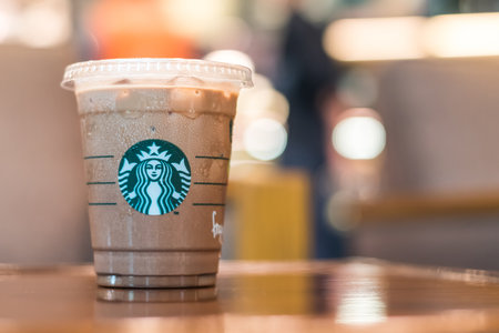 BANGKOK, THAILAND - August 07, 2016: Starbucks coffee cold beverage on table, famous coffee brand franchise originated in USAのeditorial素材