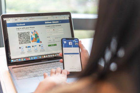 BANGKOK, THAILAND-February 26, 2019: Facebook social media app icon signup page on iphone X mobile...