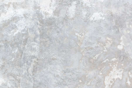 Concrete cement wall texture background in white grey with grunge weathered rough cracked pattern wallpaperの写真素材