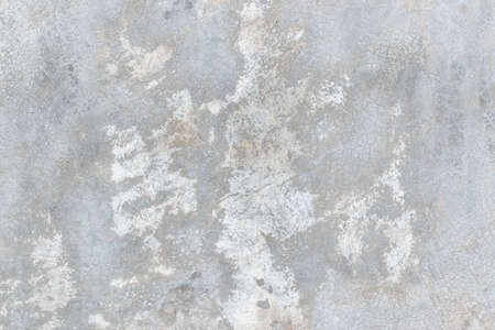 Concrete cement wall texture background in white grey with grunge weathered rough cracked pattern wallpaperの写真素材