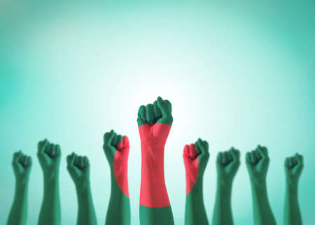 Happy independence day 26 March with Bangladesh national flag pattern on leader's fist for human equal rights, labor day conceptの写真素材