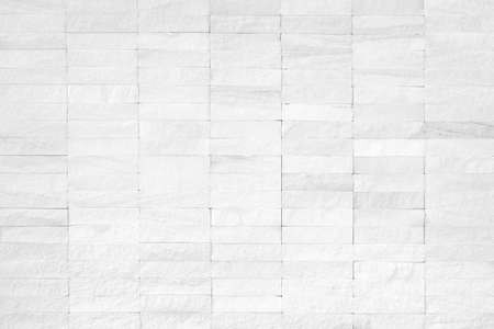 Rock tile wall texture background in white colorの写真素材