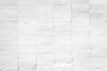 Rock tile wall texture background in white colorの写真素材