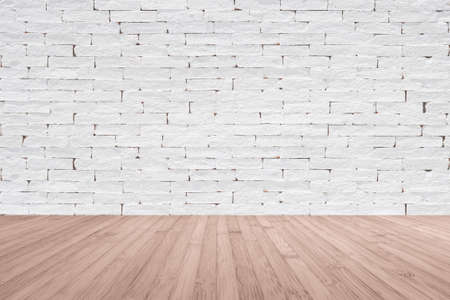 Brick wall painted in white with wooden floor textured background in natural red brown