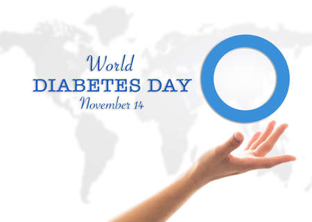 World diabetes day concept with blue circle symbolic logo on protective hands support for diabetic disease prevention screening awareness campaignの写真素材