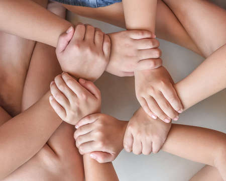Circle of friend's unity , kid's friendship concept with children's hands bonding in circleの写真素材
