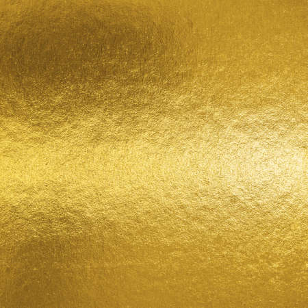 Gold foil leaf shiny metallic wrapping paper texture background for wall paper decoration elementの写真素材