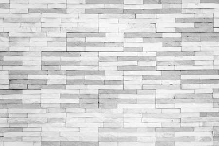 Brick tile wall texture pattern background in white grey color toneの写真素材