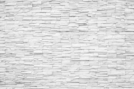 White marble brick stone tile wall grunge rustic texture backgroundの写真素材