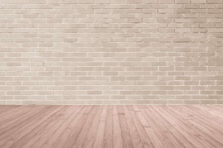Brick wall in antique beige brown texture background with wood floor in red brown の写真素材
