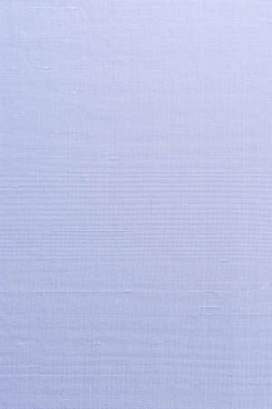 Silk cotton linen blended fabrics textile textured background in light sweet purple blueの写真素材