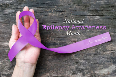 National Epilepsy Awareness Month in November: Lavender ribbon awarenessの写真素材