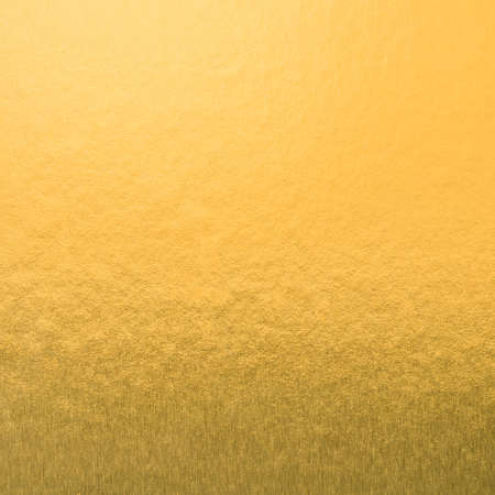 Gold foil leaf shiny wrapping paper texture background for wall paper decoration elementの写真素材