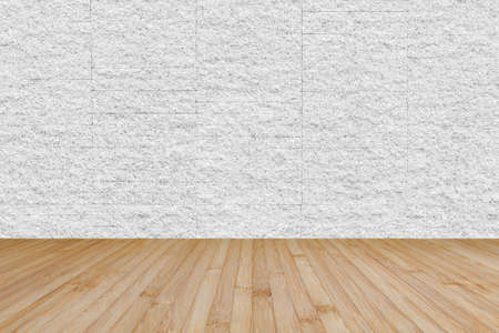 Wooden floor in yellow brown with granite stone brick tile wall aged texture pattern background in white grey colorの写真素材