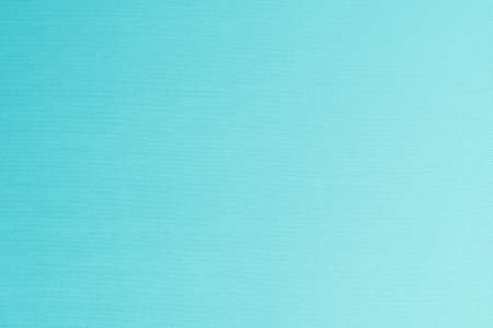 Silk fabric wallpaper texture detail background in shiny cyan blue green turquoise color の写真素材