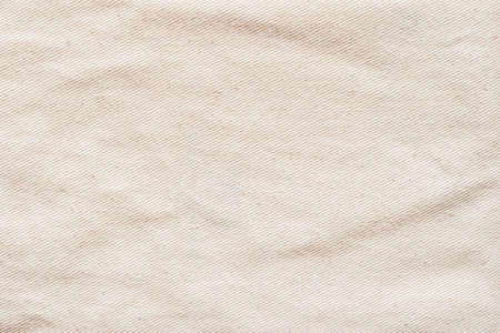 Canvas texture background of cotton burlap natural fabric cloth in old aged beige brown sepia for wallpaper and design backdropの写真素材