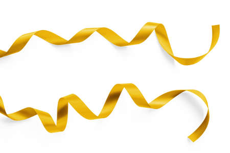 Gold satin ribbon bow scroll set isolated on white background  for Christmas and wedding card design decorationの写真素材