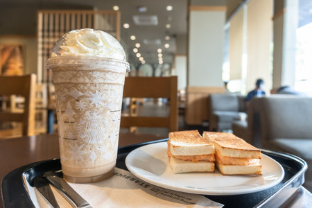 BANGKOK, THAILAND - December 23, 2020: Starbucks coffee Christmas cup drink beverage brand originated in USA celebrate xmas and new year anniversary with special design cupのeditorial素材