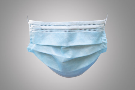 Medical face mask isolated with clipping path on grey background (front view) for covid-19,...