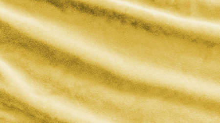 Gold velvet background or golden yellow velour flannel texture made of cotton or wool with soft...