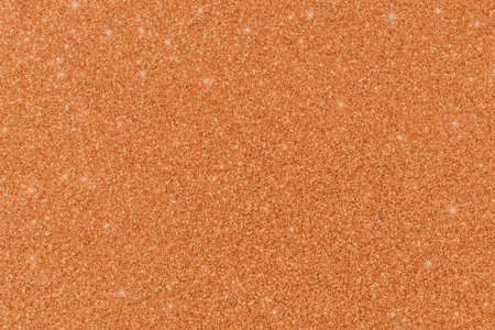 Copper gold glitter texture background sparkling shiny wrapping paper for Christmas holiday seasonal wallpaper  decoration, greeting and wedding invitation card design elementの写真素材