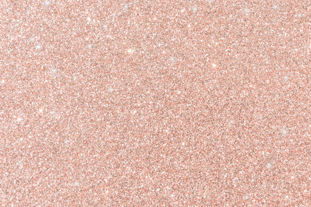 Rose gold glitter background pink red sparkling shiny wrapping paper  texture for Christmas holiday seasonal wallpaper decoration, greeting and wedding invitation card design elementの写真素材