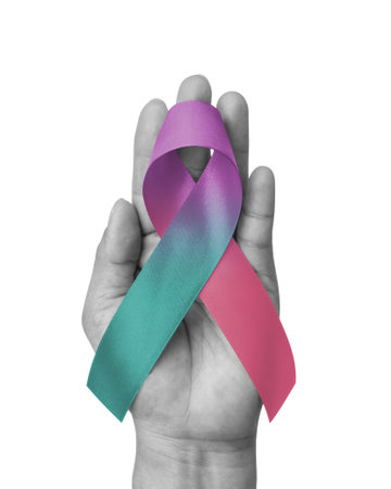 Thyroid cancer awareness ribbon for September month in teal pink blue bow color isolated on white background with clipping pathの写真素材