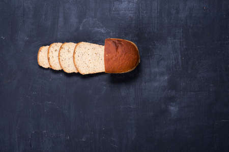 White sliced ??bread on blackboardの写真素材