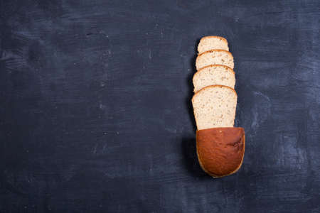 White sliced ??bread on blackboardの写真素材