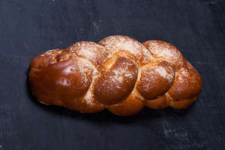 braided bread on blackboardの写真素材