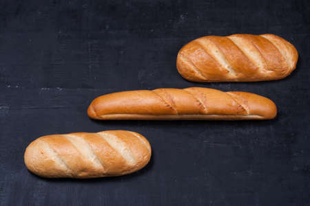 long loafs on black boardの写真素材