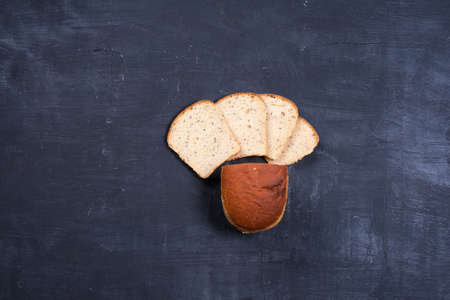 White sliced ??bread on blackboardの写真素材