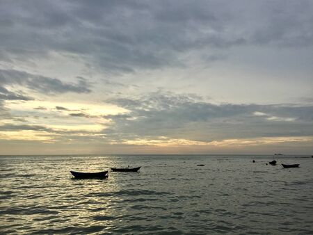 Fisherman's boat on the seaの写真素材