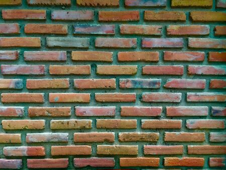 Closeup of brick wall with shade and shadowの写真素材