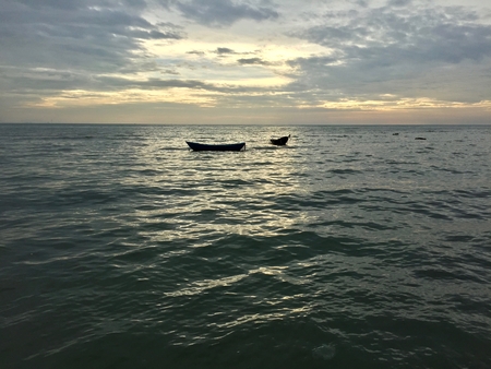 Fisherman's boat on the seaの写真素材