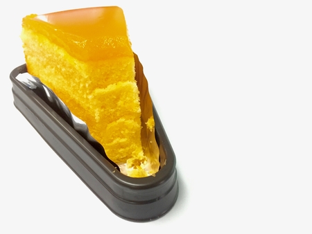 Piece of orange jam cakeの写真素材