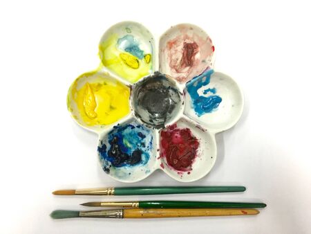 Closeup of brush and color wheelの写真素材