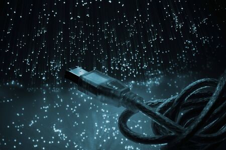 Fiber optics background with lots of blue light spotsの写真素材