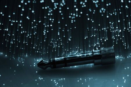 Fiber optics background with lots of blue light spotsの写真素材