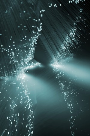 Fiber optics background with lots of light spotsの写真素材