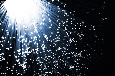 Fiber optics background with lots of light spotsの写真素材