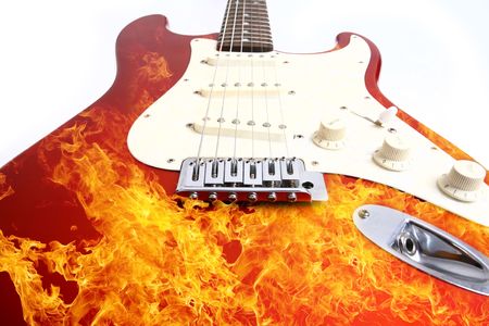 Fire electric guitar  on white backgroundの写真素材