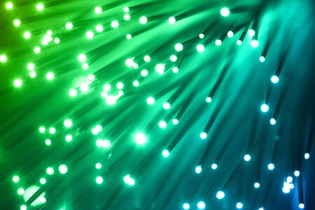 Fiber optics background with lots of light spotsの写真素材