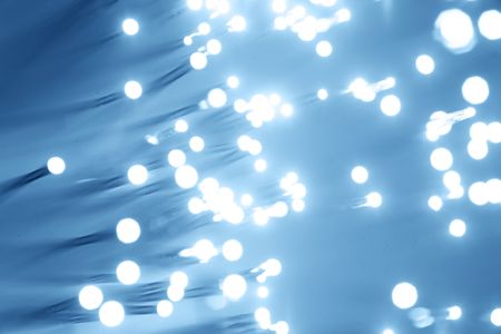 Fiber optics background with lots of light spotsの写真素材