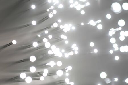 Fiber optics background with lots of light spotsの写真素材