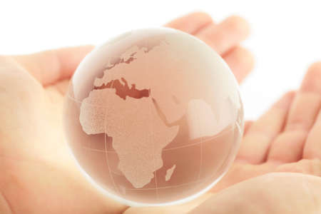hand holding globe to protect the fragile environmentの写真素材