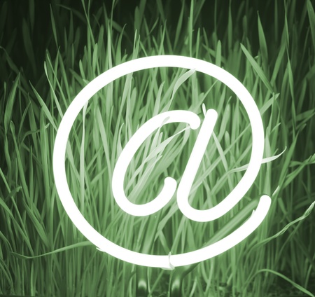e-mail and fresh grassの写真素材