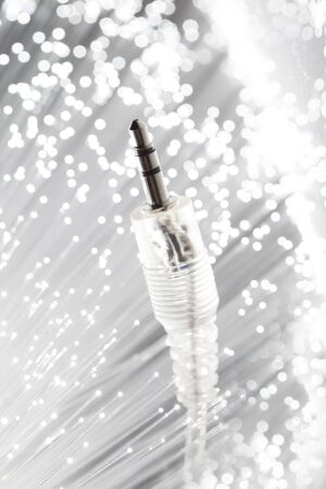 transparency audio cable on fiber optics backroundの写真素材