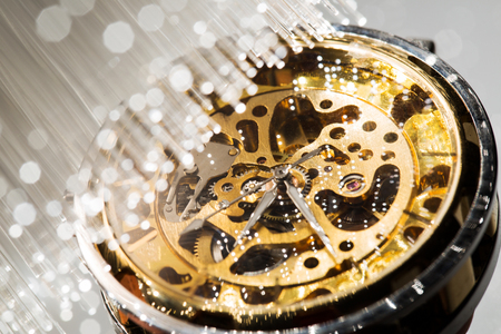 close view of watch mechanism and Fiber optics background