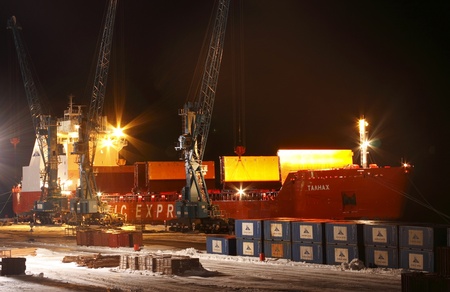 Container ship Talnach on loading in port, Dudinka, Russian Federation